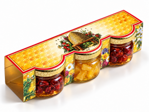 Set aus in Honig eingelegten Trockenfrüchten in einer bedruckten Pappschachtel - Reklamnepredmety